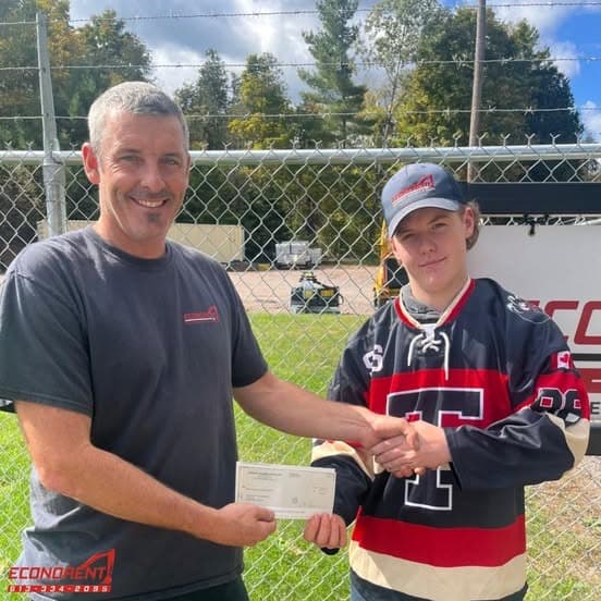 Player #96, Ethan Woods, accepted our sponsorship on behalf of the team.