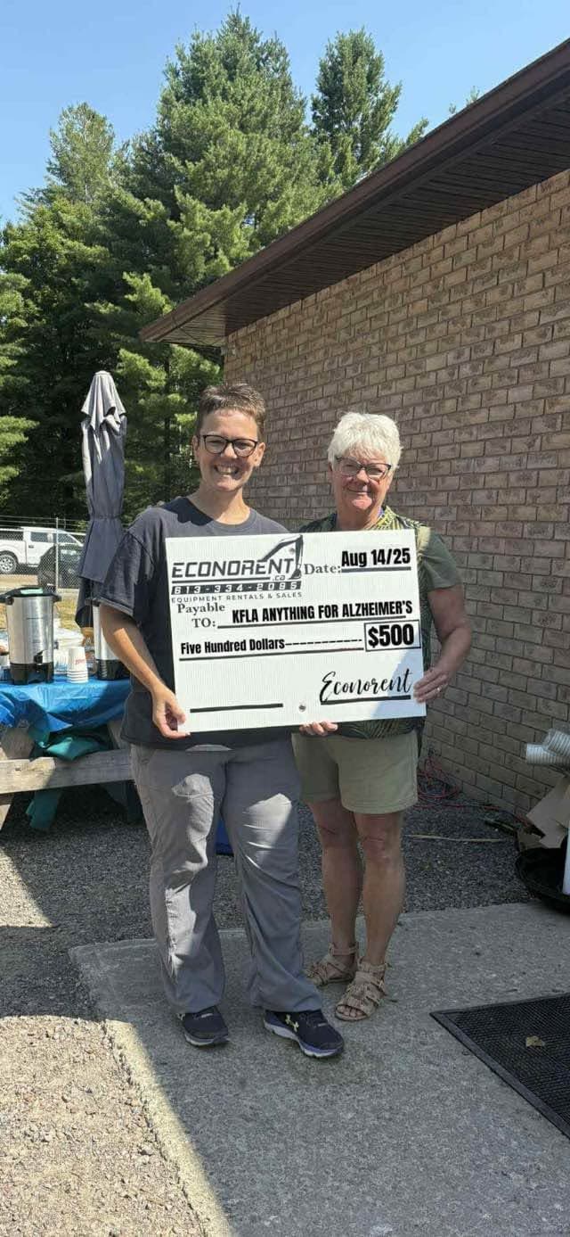 Presenting a $500 donation in support of the Alzheimer Society Walk