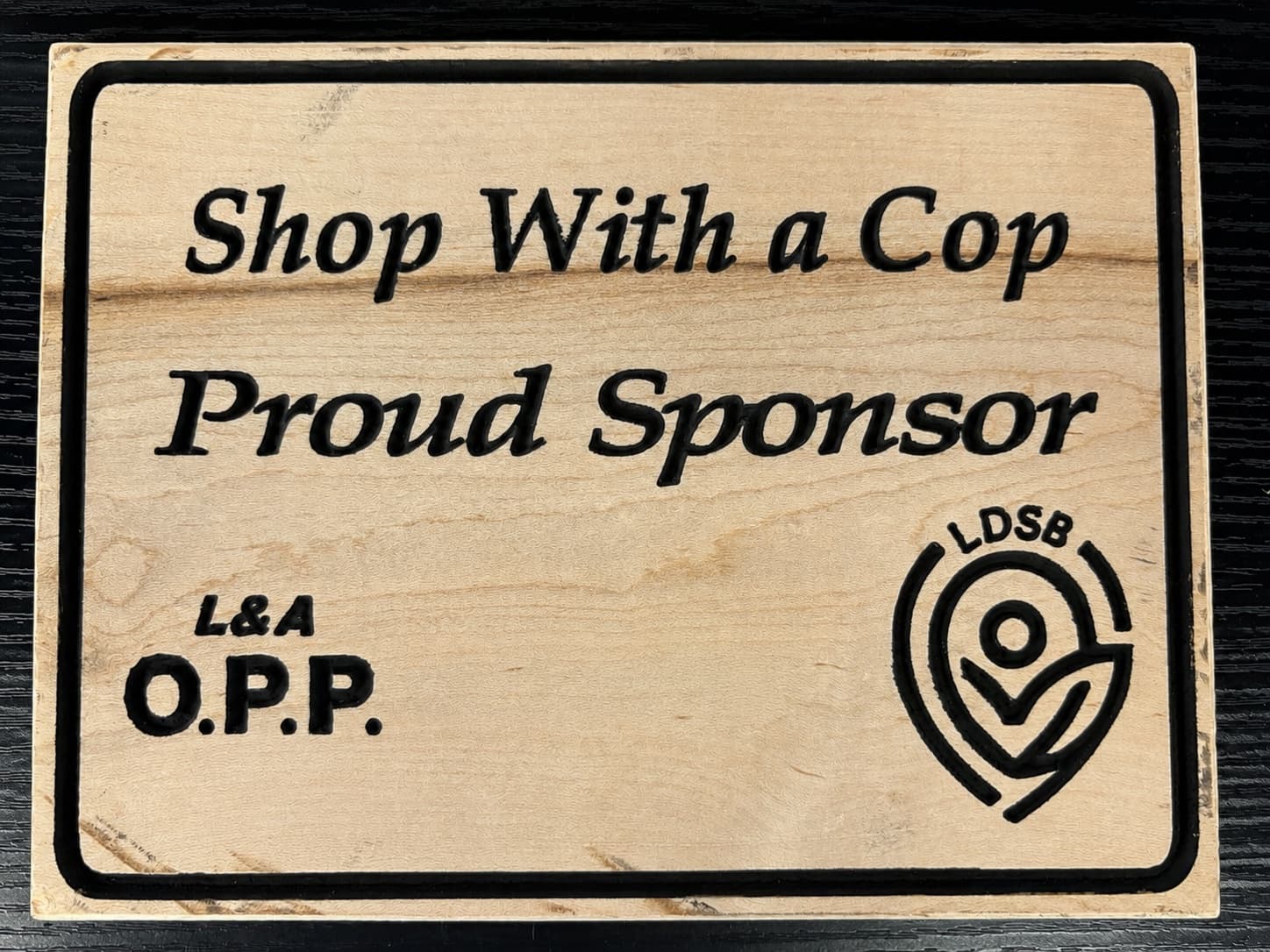 Shop With a Cop proud sponsor plaque from the L&A OPP and LDSB