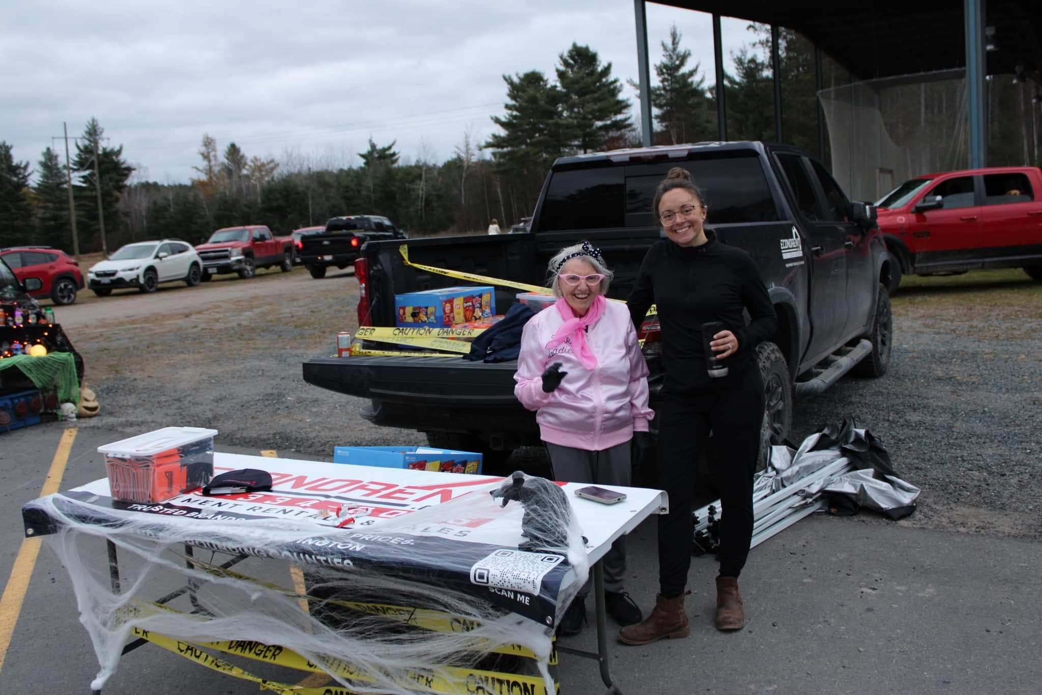 Econorent team handing out treats at Flinton's Trunk or Treat